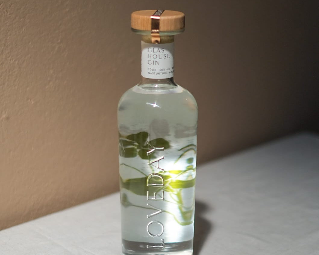 Glas House Gin bottle by Loveday Distillery, clear glass with botanical infusion, wooden cap, white neck label, 70cl 40% vol