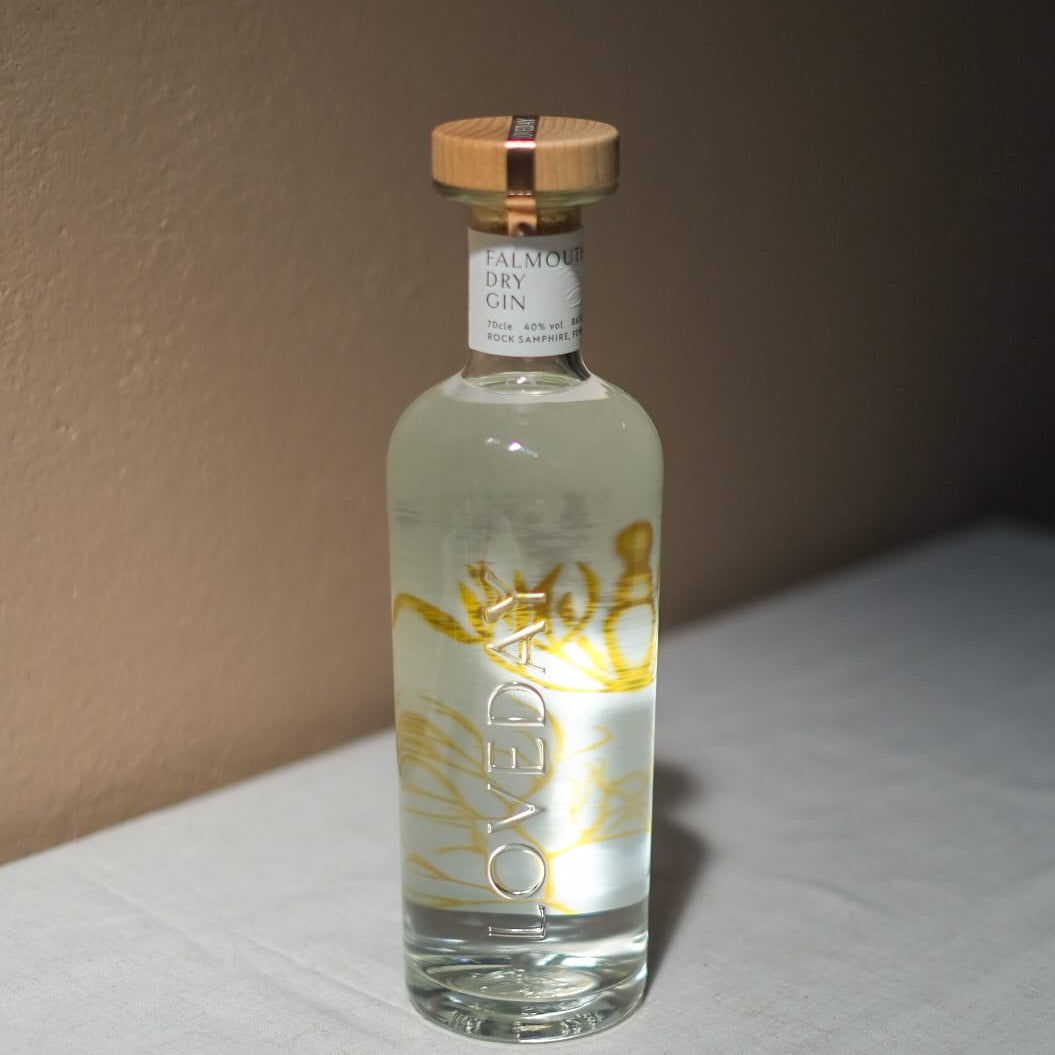 Loveday Distillery Falmouth Dry Gin 70cl bottle with gold botanical illustration and wooden cap on white surface