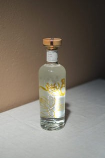 Loveday Distillery Falmouth Dry Gin 70cl bottle with gold botanical illustration and wooden cap on white surface