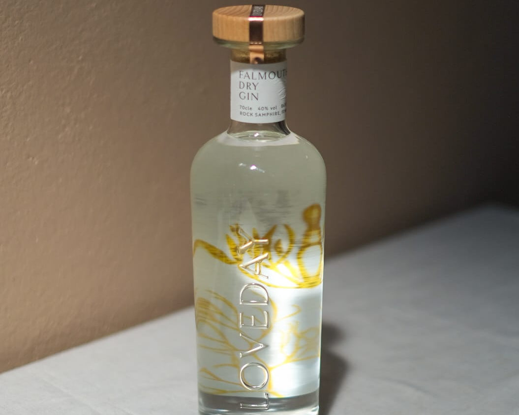 Loveday Distillery Falmouth Dry Gin 70cl bottle with gold botanical illustration and wooden cap on white surface